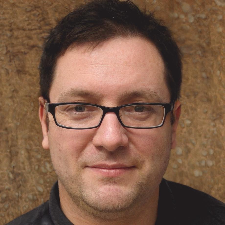 Casimir Thorne working on floral arrangement design